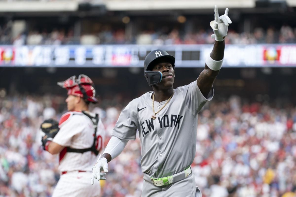 New York Yankees’ Jazz Chisholm, right, reacts after his solo home run during the second inning of a baseball game against the Philadelphia Phillies, Monday, July 29, 2024, in Philadelphia.