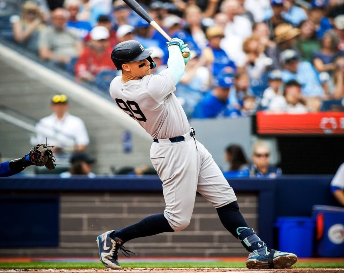 New York Yankees’ Aaron Judge hits a home run against the Toronto Blue Jays in Toronto, Sunday, June 30, 2024.