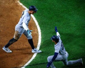 Yankees' Juan Soto congrats Aaron Judge after his 300th home run on August 14, 2024, in Chicago.