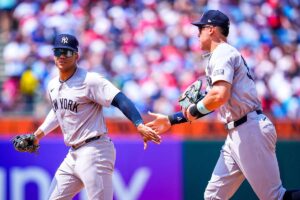 Aaron Judge and Juan Soto playing during a Yankees game in the 2024 MLB season