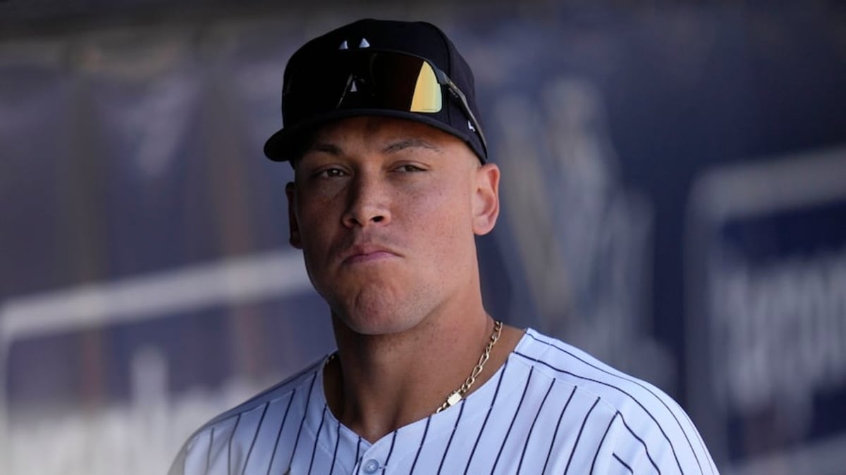 New York Yankees outfielder Aaron Judge walks in the dugout before a spring training game against the Atlanta Braves earlier this month in Tampa.