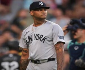 New York Yankees starting pitcher Luis Gil reacts after a home run by Chicago White Sox during the first inning of a baseball game Monday, Aug. 12, 2024, in Chicago.