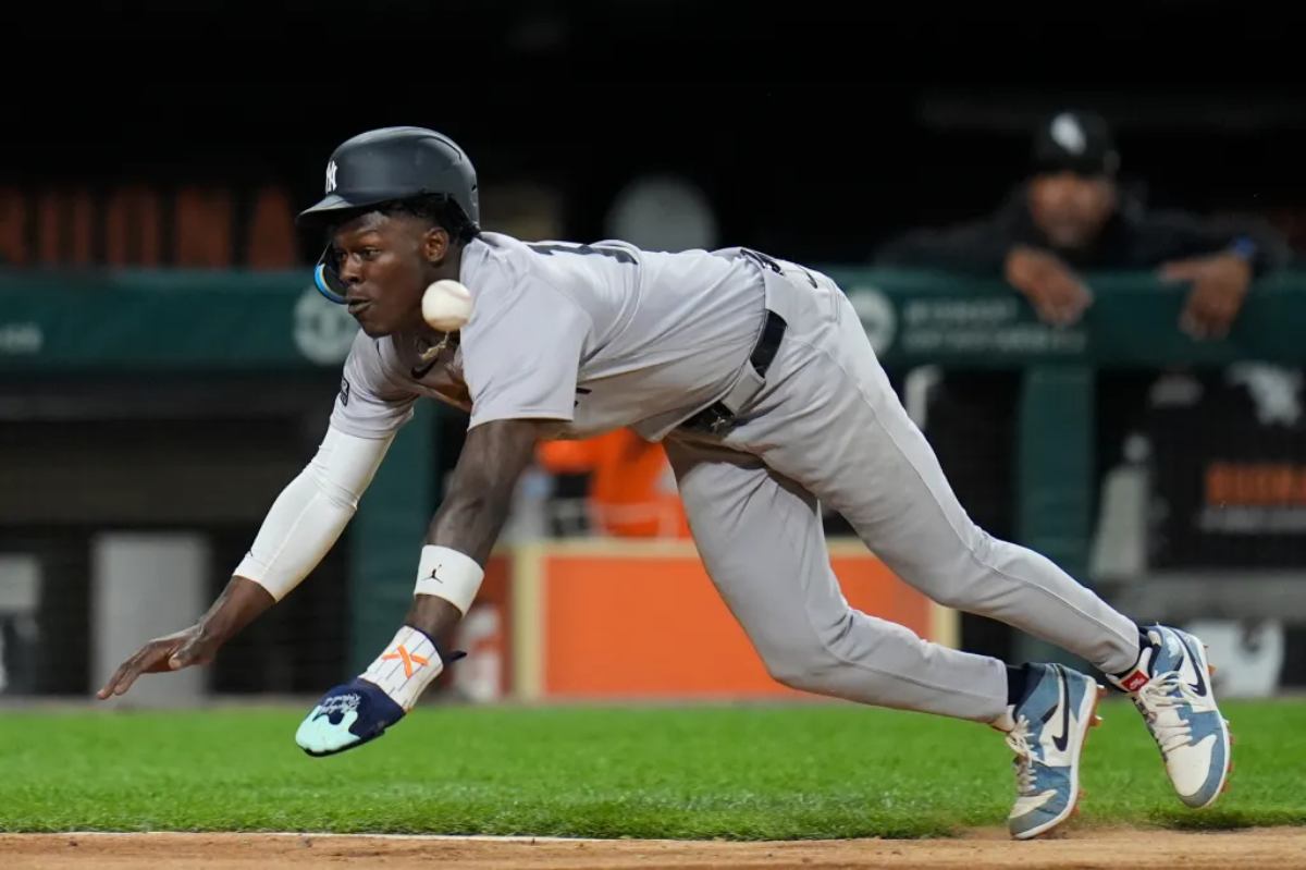 Yankees' Jazz Chisholm Jr. exited the game vs. the White Sox in the fifth inning due to an elbow injury on August 12, 2024, in Chicago.