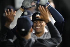 New York Yankees’ Juan Soto celebrates his third home run of the game during the seventh inning of a baseball game against the Chicago White Sox on Tuesday, Aug. 13, 2024, in Chicago.