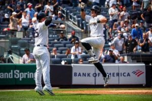 Juan Soto and Anthony Volpe celebrating during the Yankees’ win over the Blue Jays on Aug. 3, 2024.