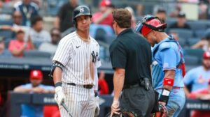 Yankees third base Oswaldo Cabrera reacts after being called out on a pitch clock violation during a game against the St. Louis Cardinals at Yankee Stadium on Saturday.