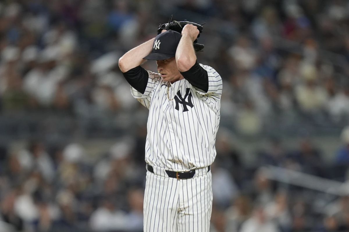 New York Yankees pitcher Tim Hill reacts after loading the bases during the fifth inning of a baseball game against the Cleveland Guardians at Yankee Stadium Tuesday, Aug. 20, 2024, in New York.