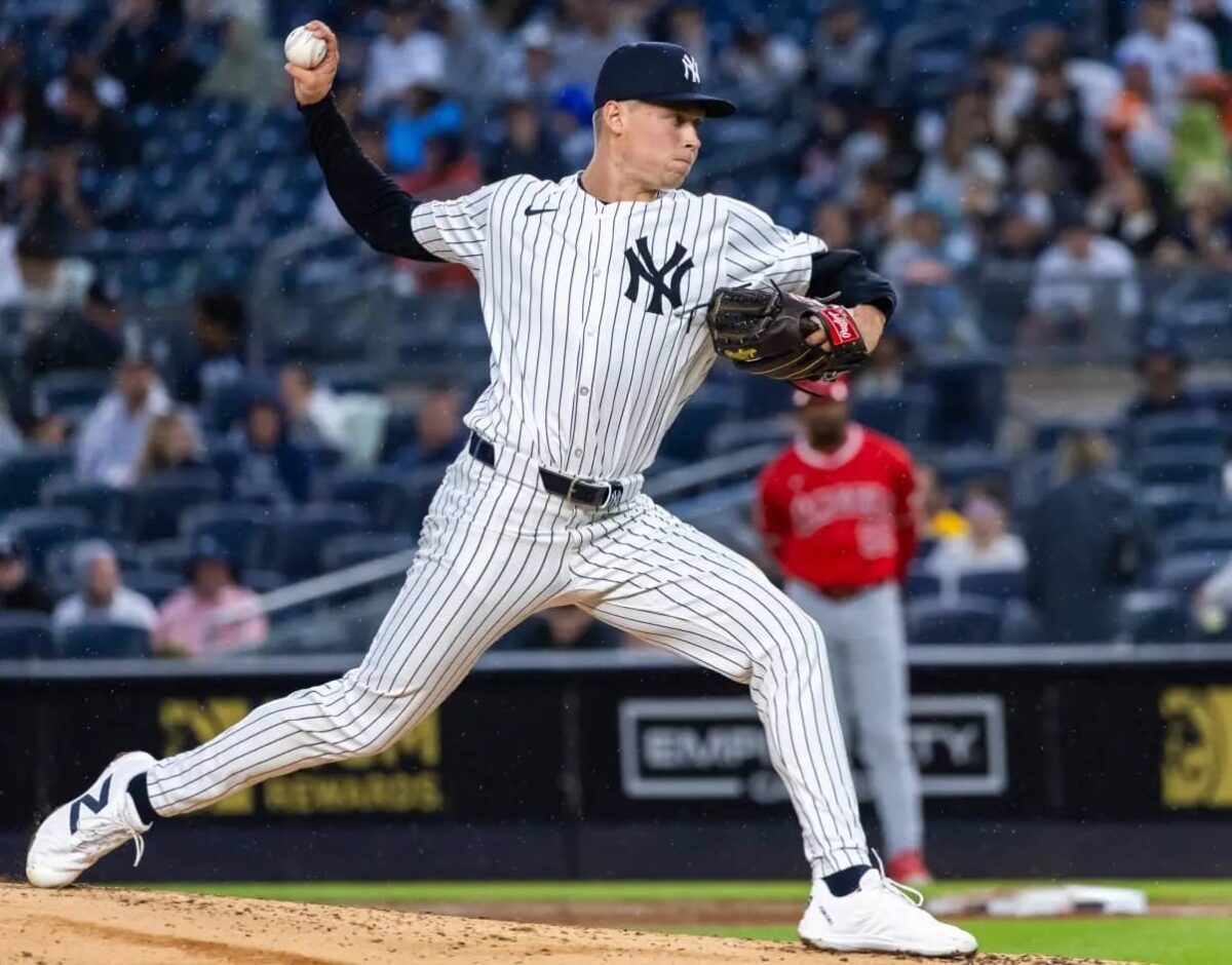 Yankees' pitcher Will Warren is in action against the Angels at Yankee Stadium on August 7, 2024.