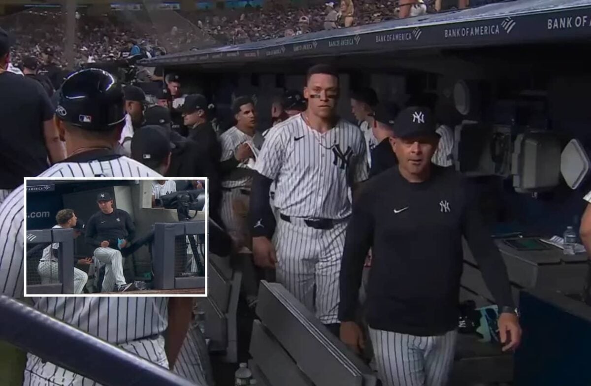 El manager de los Yankees Boone, el capitán Judge y Torres en el banquillo después de que el segunda base fuera enviado al banquillo a mitad de partido el 2 de agosto de 2024.