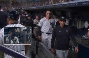 Yankees manager Boone, captain Judge, and Torres in the dug out after the second baseman was benched midgame on August 2, 2024.
