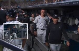 Yankkes manager Boone, captain Judge, and Torres in the dug out after the second baseman was benched midgame on August 2, 2024.