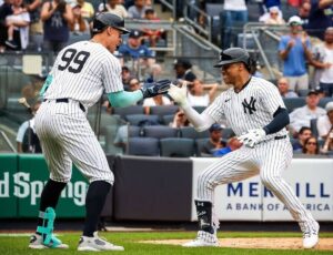 Aaron Judge and Juan Soto celebrate after 9-1 win over the Rays on July 22, 2024, at Yankee Stadium.