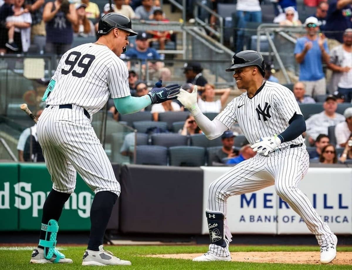 Aaron Judge and Juan Soto celebrate after 9-