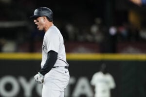 New York Yankees’ Anthony Rizzo reacts after hitting an RBI double against the Seattle Mariners during the 10th inning of a baseball game Wednesday, Sept. 18, 2024, in Seattle.