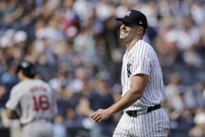 New York Yankees starting pitcher Carlos Rodon walks off the field during the fifth inning of a baseball game against the Boston Red Sox, Sunday, Sept. 15, 2024, in New York.