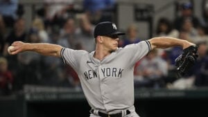 Sam Hodde/AP New York Yankees relief pitcher Ian Hamilton pitches during the seventh inning of a baseball game against the Texas Rangers, Saturday, April 29, 2023, in Arlington, Texas.