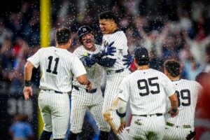 The New York Yankees celebrate after Juan Sot's walk-off hit helped the Yankees beat the Red Sox at Yankee Stadium on September 12, 2024.