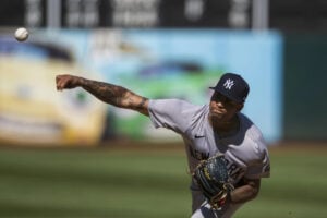 New York Yankees pitcher Luis Gil throws during the fifth inning of a baseball game against the Oakland Athletics in Oakland, Calif., Sunday, Sept. 22, 2024.