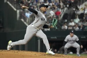 New York Yankees starting pitcher Marcus Stroman works against the Texas Rangers during the first inning of a baseball game Wednesday, Sept. 4, 2024, in Arlington, Texas.