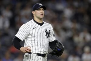 New York Yankees relief pitcher Tommy Kahnle reacts after giving up a two-run home run to Pittsburgh Pirates’ Bryan Reynolds during the eighth inning of a baseball game Friday, Sept. 27, 2024, in New York.