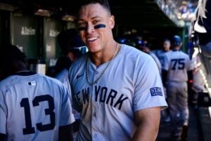 Yankees captain Aaron Judge celebrates in dugout after the Yankees beat the Cubs 4-0 in Chicago on September 07, 2024.