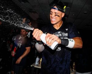 Captain Aaron Judge celebrates as the New York Yankees defeat the Baltimore Orioles to win the AL East title at Yankee Stadium on Sept. 26, 2024.