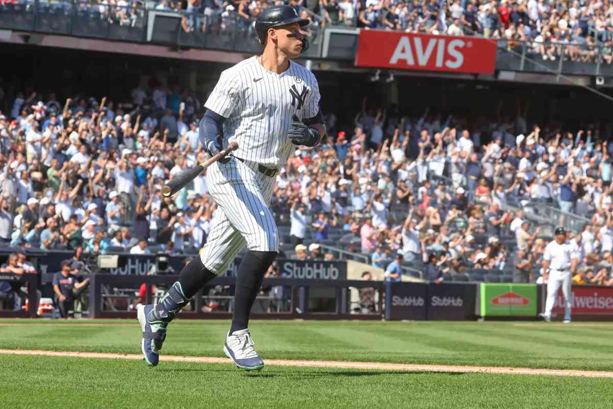 On Sunday, Sept. 15, 2024, Aaron Judge watches his towering 53rd home run of the season soar towards center field, a crucial blast in the Yankees' series-clinching win against Boston.