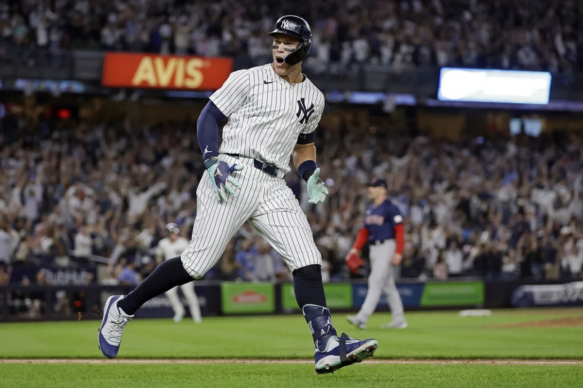 New York Yankees’ Aaron Judge reacts after hitting a grand slam off Boston Red Sox relief pitcher Cam Booser during the seventh inning of a baseball game Friday, Sept. 13, 2024, in New York.