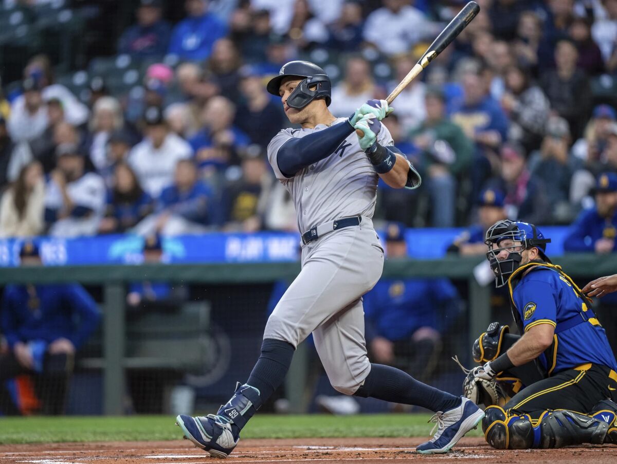 New York Yankees’ Aaron Judge hits a two-run designated hitter during the first inning of a baseball game against the Seattle Mariners, Tuesday, Sept. 17, 2024, in Seattle. 