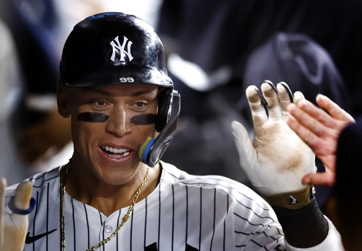 New York Yankees’ Aaron Judge celebrates in the dugout after hitting a home run against the Baltimore Orioles during the seventh inning of a baseball game, Thursday, Sept. 26, 2024, in New York. 