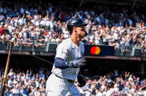 On Sunday, Sept. 15, 2024, Aaron Judge is seen running the bases, leaving the bat behind after launching his towering 53rd home run of the season, a key moment in the Yankees' series-clinching win against the Red Sox.