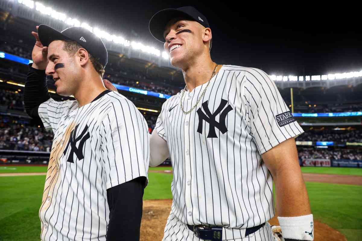 "Yankees star Aaron Judge celebrating with teammate Anthony Rizzo after hitting his 58th home run of the 2024 season, highlighting his MVP-caliber campaign and helping lead the Yankees to the AL East title.