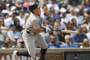 Yankees starter Anthony Volpe watches his RBI sacrifice fly during the esecond inning of a baseball game vs Chicago Cubs in Chicago on Sept 8, 2024