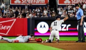 Anthony Volpe is in action in the Yankees vs. Cardinals game at Yankee Stadium on August 31, 2024.