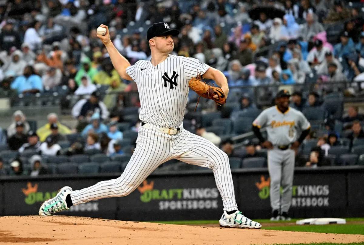 On September 29, 2024, Yankees pitcher Clarke Schmidt delivers a pitch in a rain-soaked finale at Yankee Stadium, where the Yankees defeated the Pittsburgh Pirates 6-4.