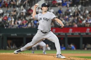 New York Yankees starting pitcher Gerrit Cole throws to the Texas Rangers in the first inning of a baseball game, Monday, Sept. 2, 2024, in Arlington, Texas.