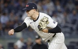 Jake Cousins, New York Yankees reliever, on the mound during a September 19 game against the Seattle Mariners before leaving early due to a noticeable drop in velocity.