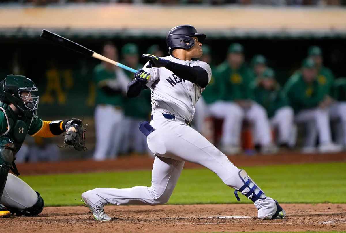 Juan Soto #22 of the New York Yankees hits a pinch-hit RBI double scoring Oswaldo Cabrera #95 (not in the image) against the Oakland Athletics in the top of the 10th inning at the Oakland Coliseum on September 20, 2024 in Oakland, California. 3Juan Soto of the New York Yankees hits a pinch-hit RBI double scoring Oswaldo Cabrera against the Oakland Athletics in the top of the 10th inning at the Oakland Coliseum on September 20, 2024 in Oakland, California.