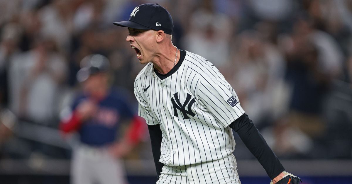 Luke Weaver celebrates on the mound after a critical save for the New York Yankees.