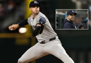 Yankees closer Clay Holmes and manager Aaron Boone on September 3, 2024, at Arlington, Texas.