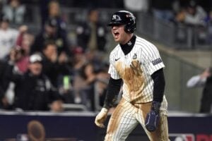 New York Yankees’ Anthony Volpe reacts after scoring against the Los Angeles Dodgers during the eighth inning in Game 4 of the baseball World Series, Tuesday, Oct. 29, 2024, in New York.