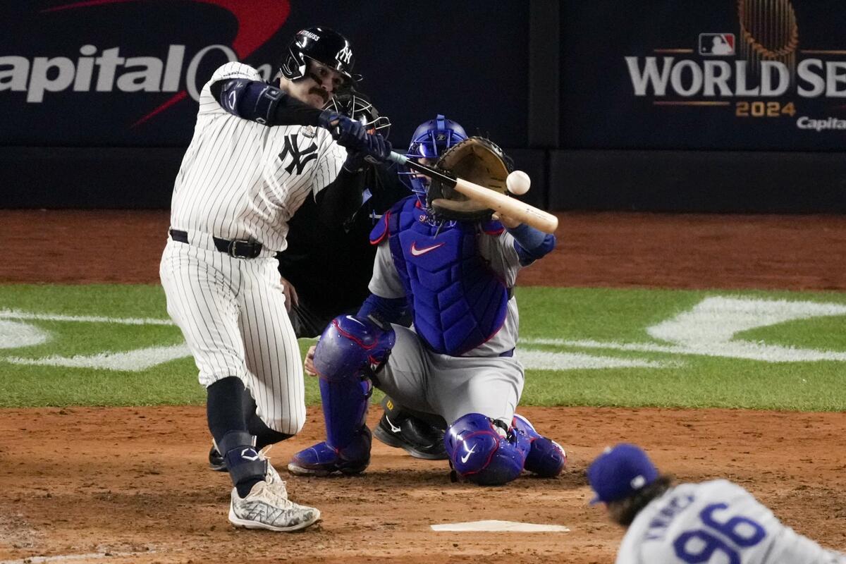 New York Yankees’ Austin Wells hits home run against the Los Angeles Dodgers during the sixth inning in Game 4 of the baseball World Series, Tuesday, Oct. 29, 2024, in New York.