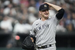 New York Yankees starting pitcher Clarke Schmidt leaves the game during the sixth inning of a baseball game against the Chicago White Sox, Tuesday, Aug. 8, 2023, in Chicago.