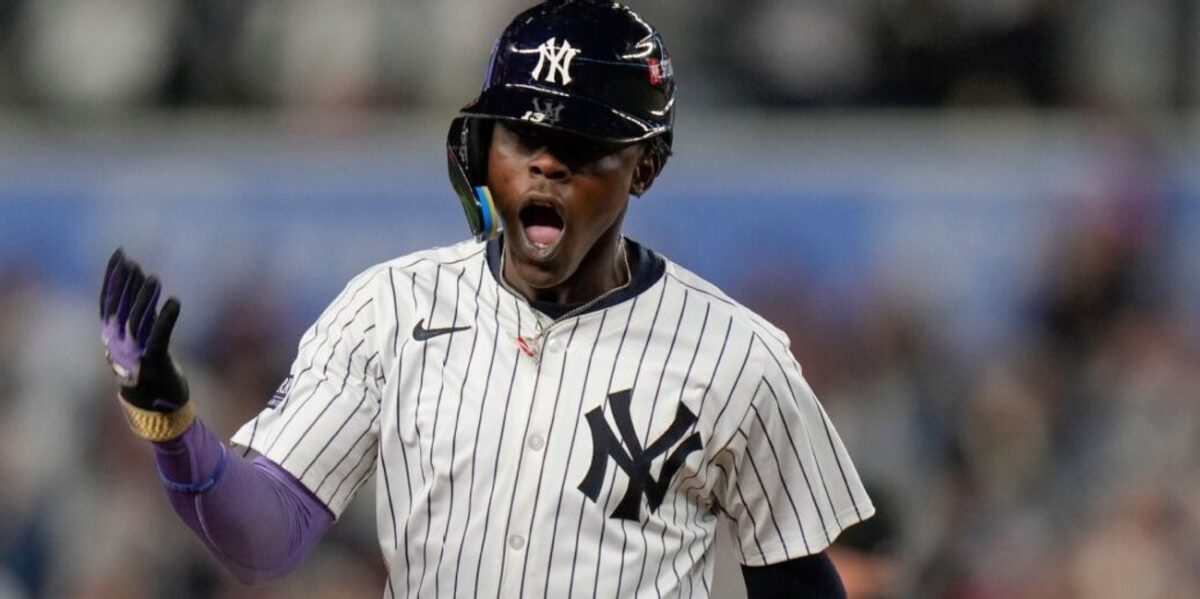 Yankees' Jazz Chisholm reacts after hitting a late home run against the Royals in New York, Oct. 7, 2024.