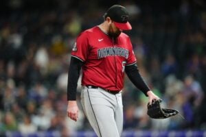 Sep 17, 2024; Denver, Colorado, USA; Arizona Diamondbacks starting pitcher Jordan Montgomery (52) leaves the mound in the fifth inning against the Colorado Rockies at Coors Field.