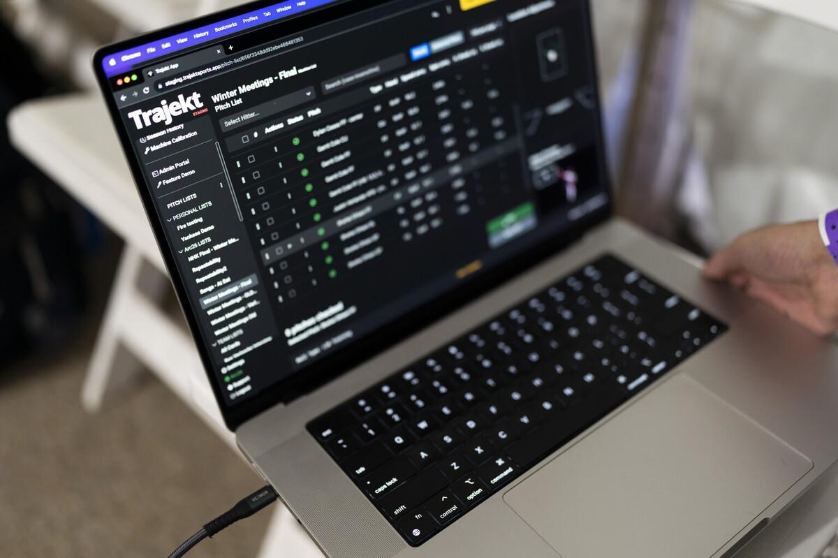 A laptop is used to demonstrate the Trajekt Arc pitching machine during the Major League Baseball winter meetings Wednesday, Dec. 6, 2023, in Nashville, Tenn.