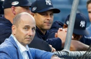 Aaron Boone and Brian Cashman at a Yankees training season.