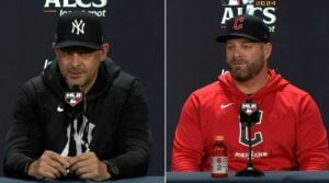 Yankees' manager Aaron Boone and Guardians' manager Stephen Vogt are talking to reporters at Yankee Stadium on October 13, 2024, a day before the start of the 2024 ALCS series.