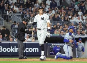 Yankees outfielder Aaron Judge #99 reacts after he strikes out swinging with two runners on during the first inning.