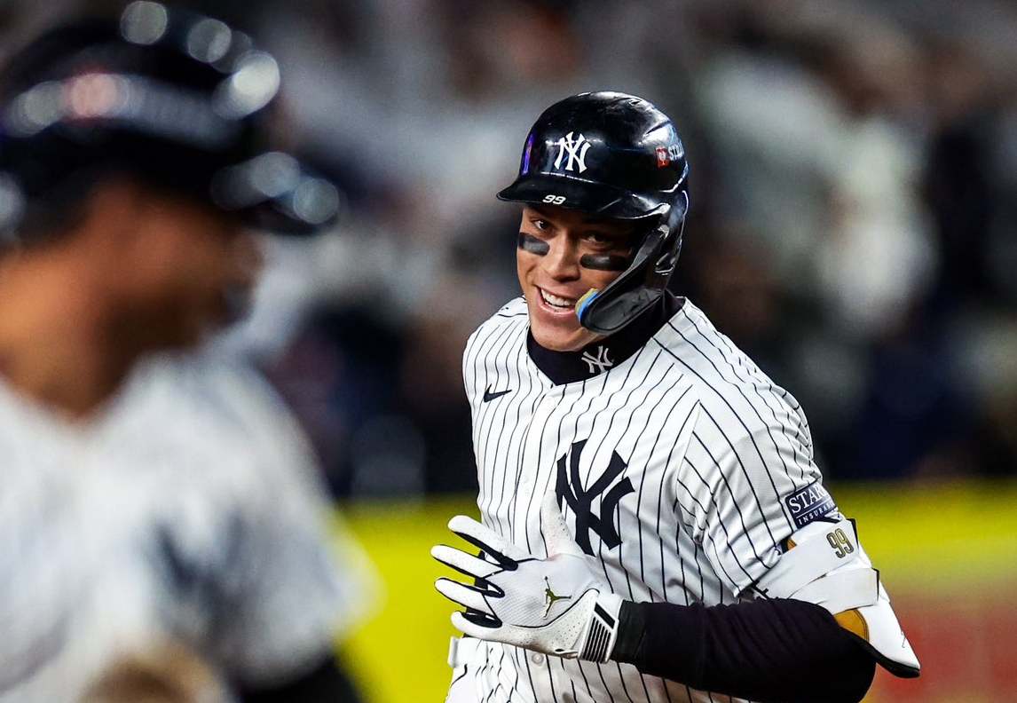 New York Yankees’ Aaron Judge celebrates after hitting a two-run home run against the Cleveland Guardians during the seventh inning in Game 2 of the baseball AL Championship Series Tuesday, Oct. 15, 2024, in New York.